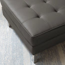 Loft Tufted Upholstered Faux Leather Ottoman